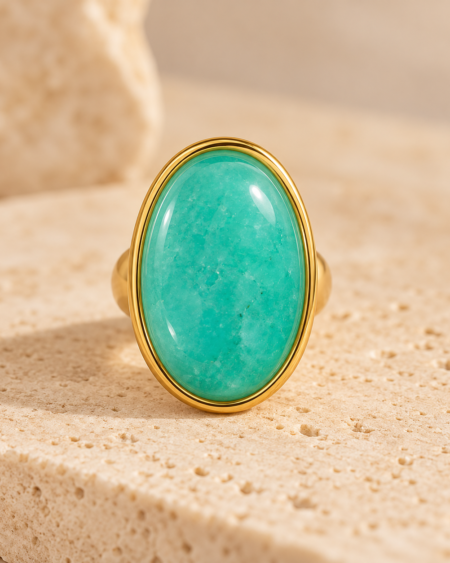 Anillo Dorado con Piedra Ovalada Turquesa